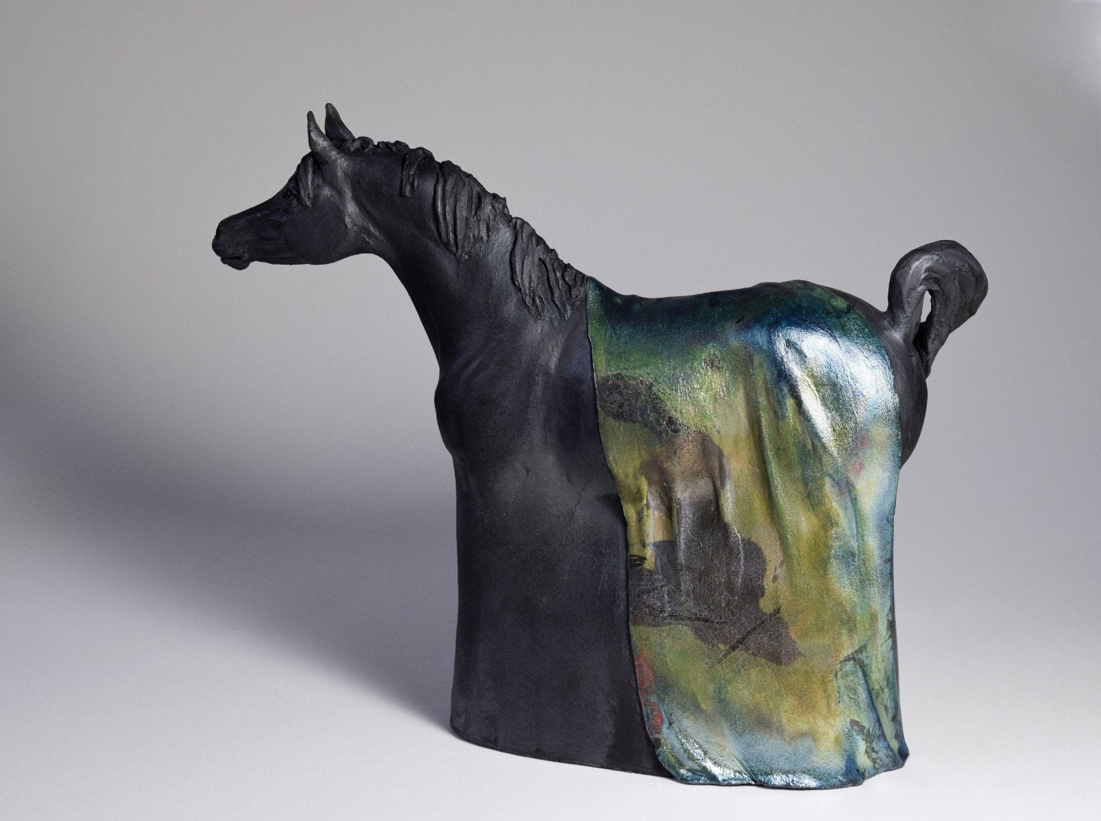 Black raku ceramic Arabian horse sculpture by Susie Benes