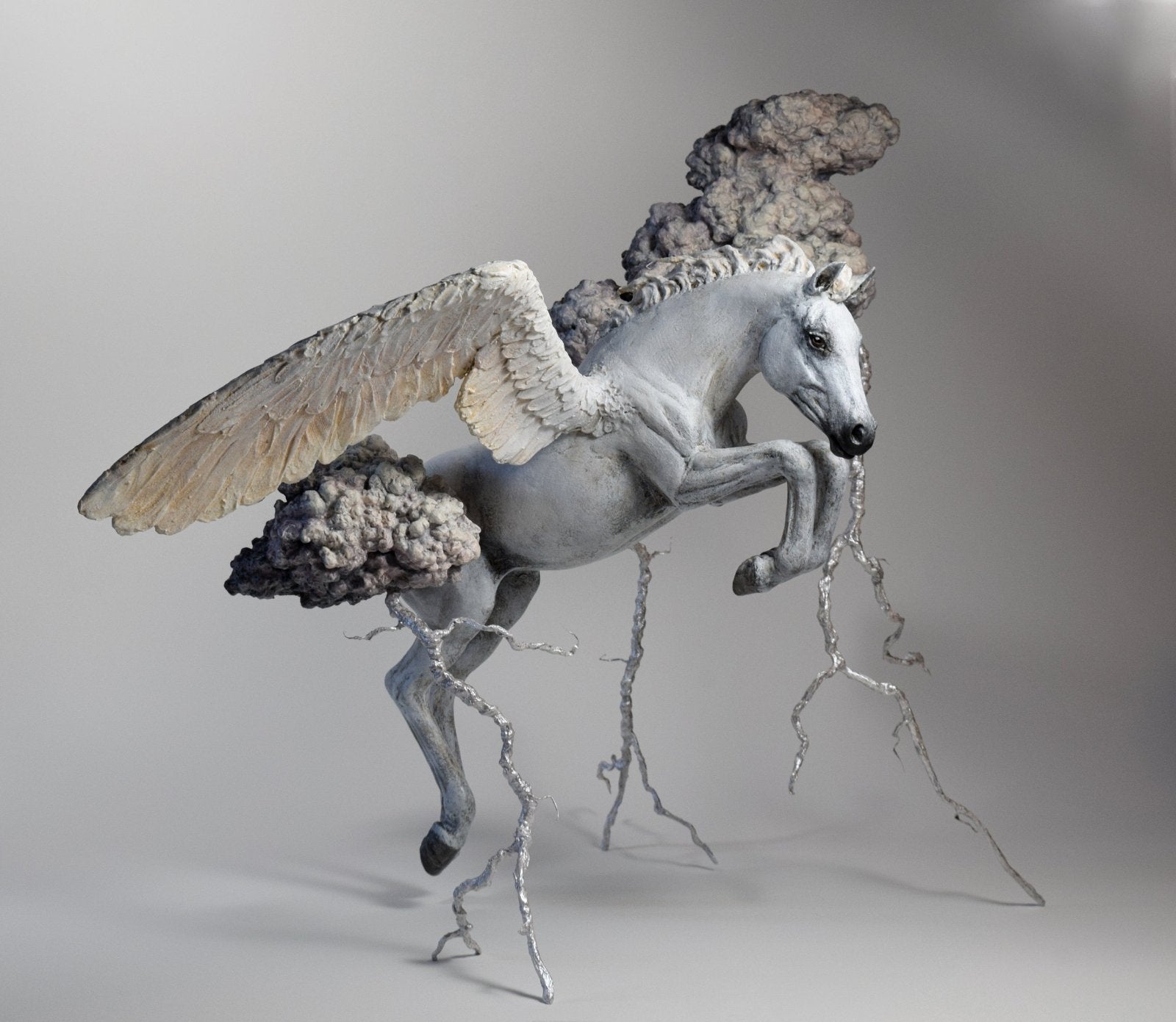 Mixed Media air dry clay pegasus sculpture flying through thunder