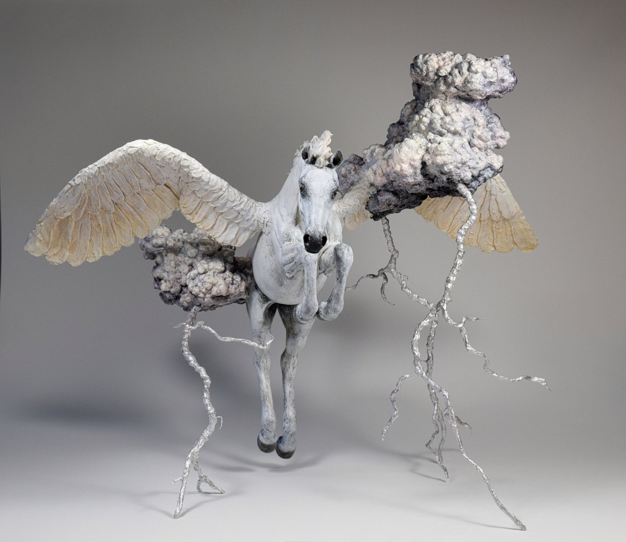Mixed Media air dry clay pegasus sculpture flying through thunder