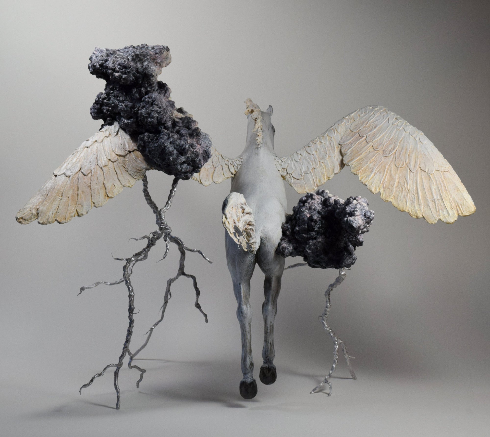 Mixed Media air dry clay pegasus sculpture flying through thunder