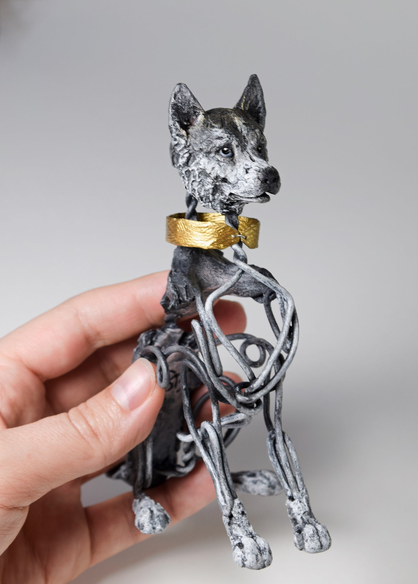 Air dry clay and wire husky dog sculpture by Susie Benes