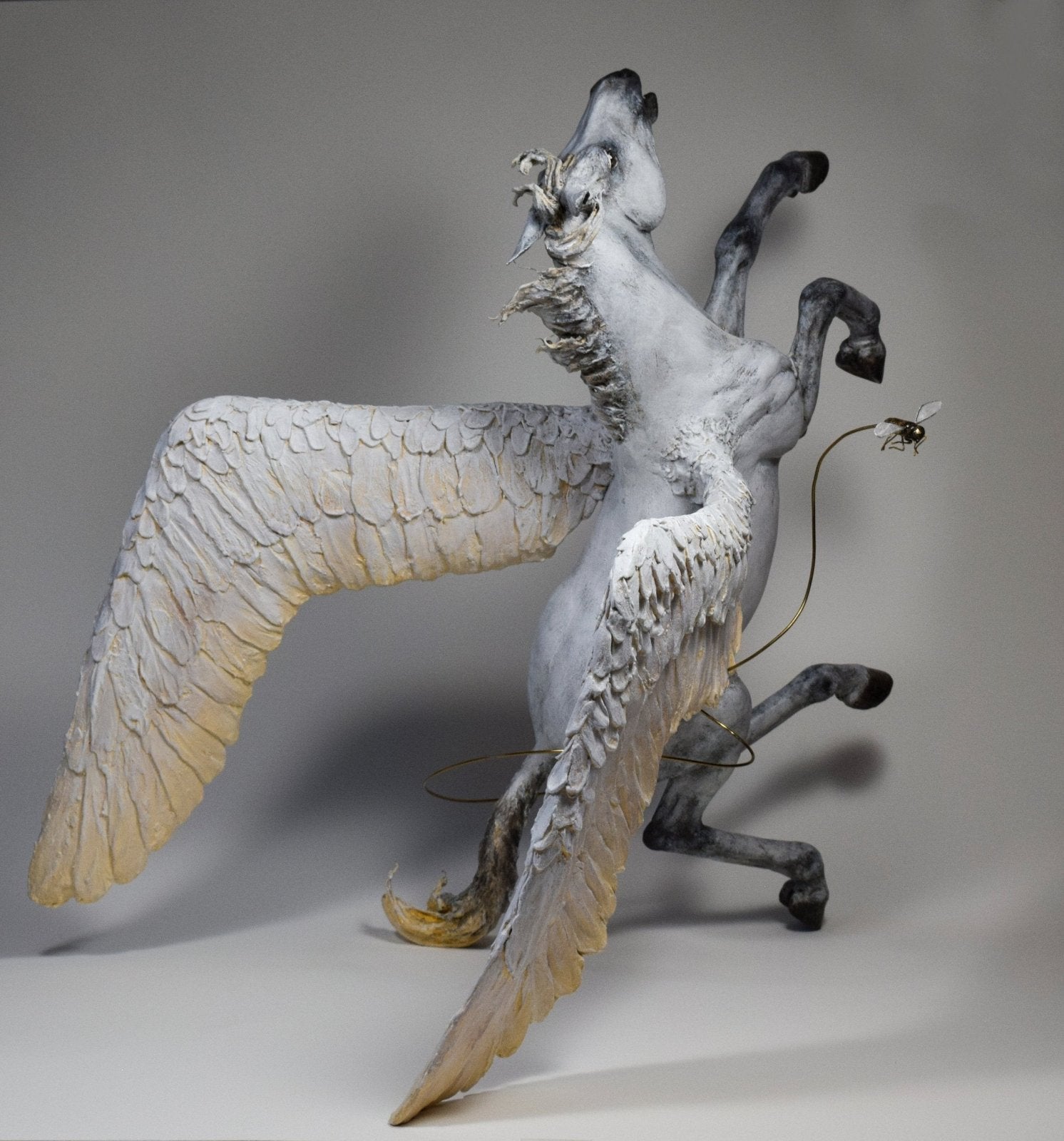 Pegasus falling from Olympus sculpture with gad fly