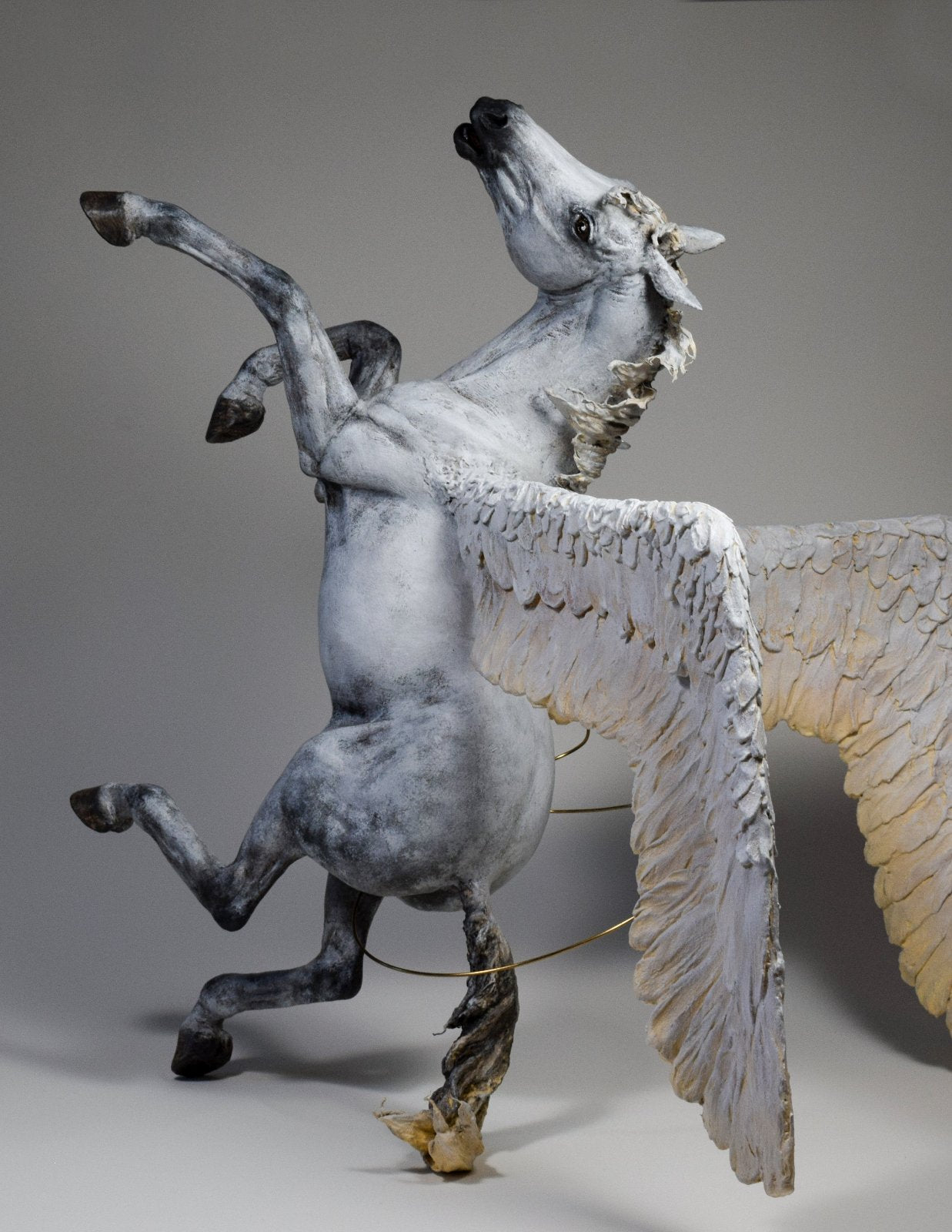 Pegasus falling from Olympus sculpture by Susie Benes