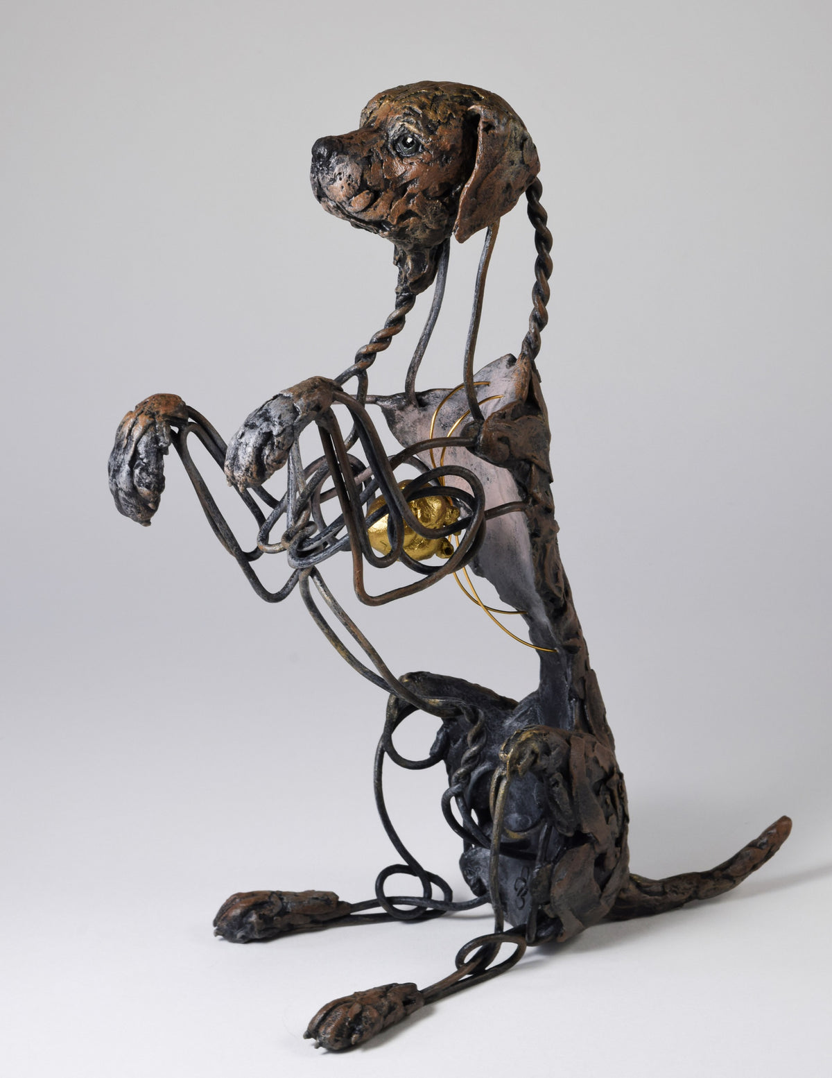 Air dry clay and wire dog sculpture by Susie Benes