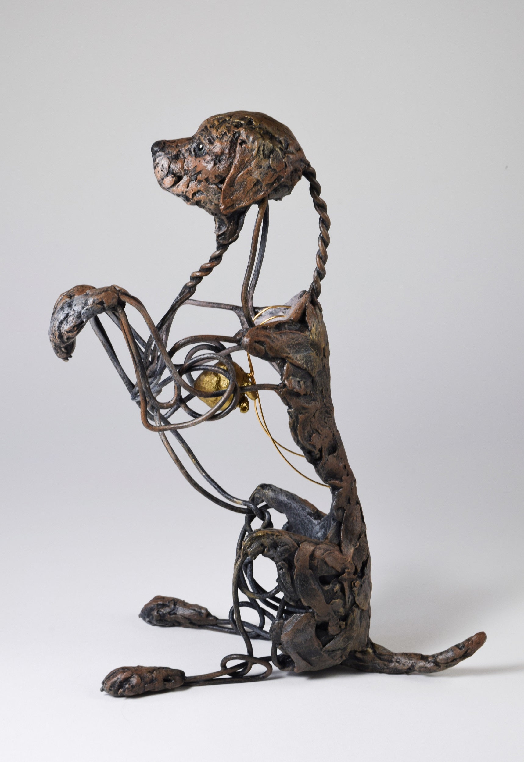 Air dry clay and wire dog sculpture by Susie Benes