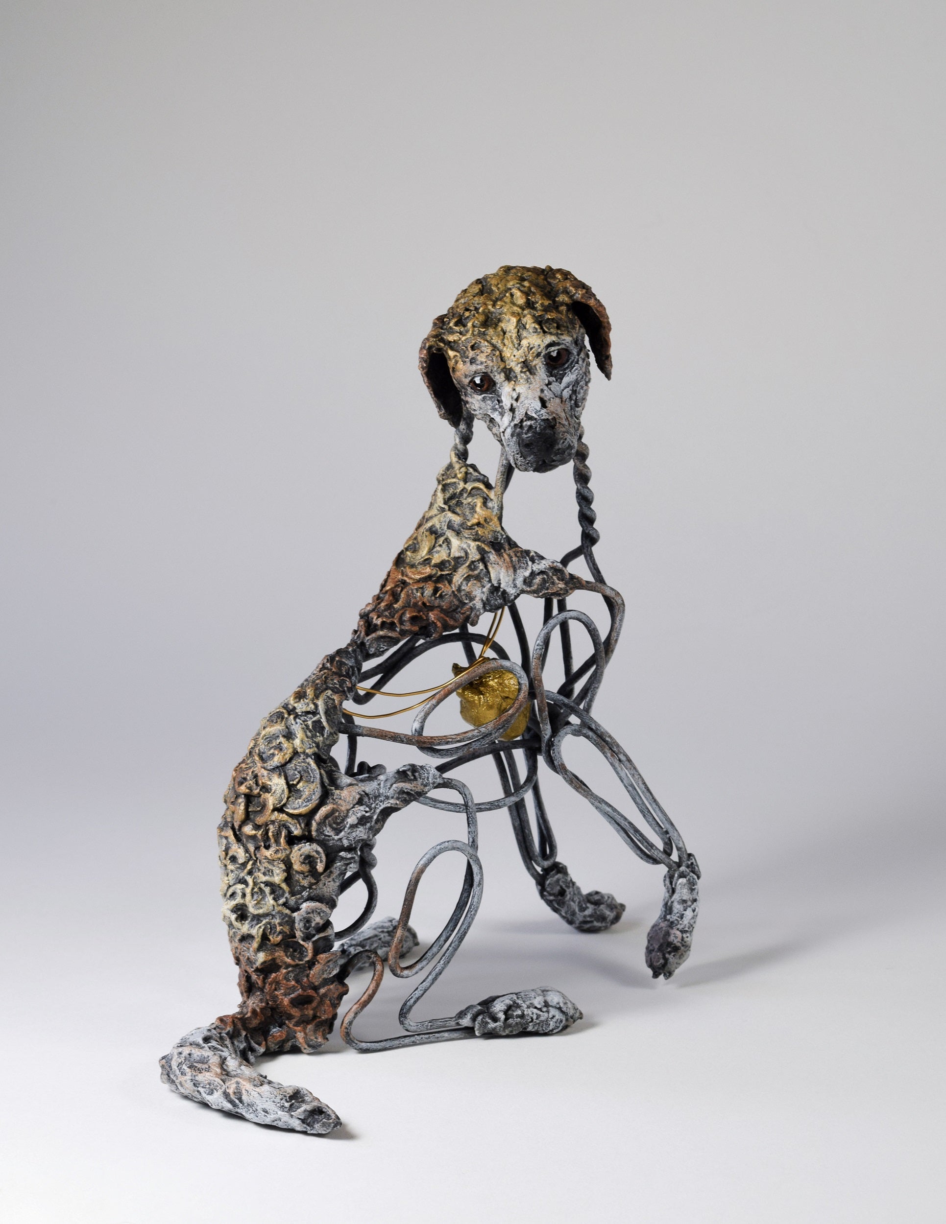 Air dry clay and wire dog sculpture by Susie Benes