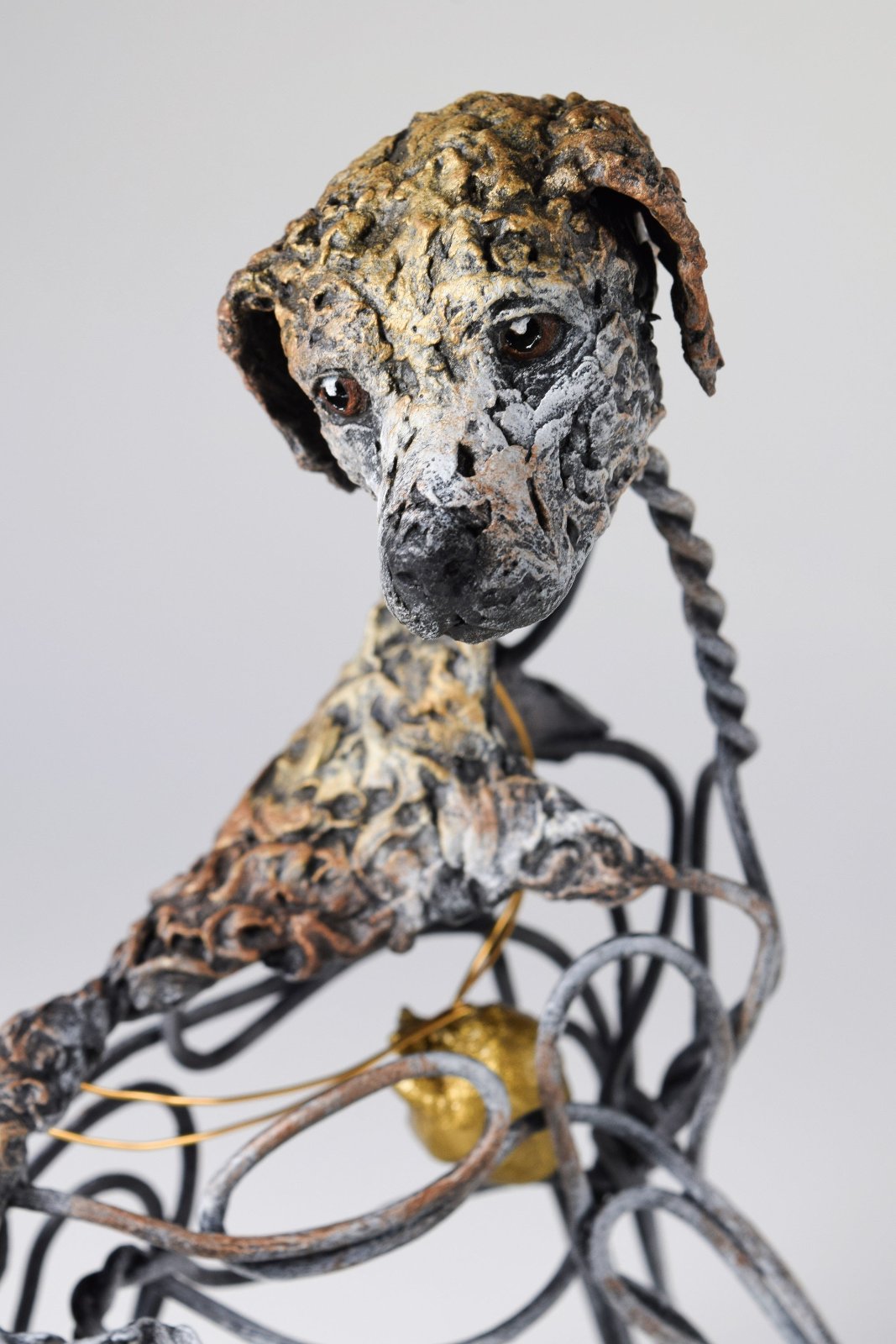 Air dry clay and wire dog sculpture by Susie Benes
