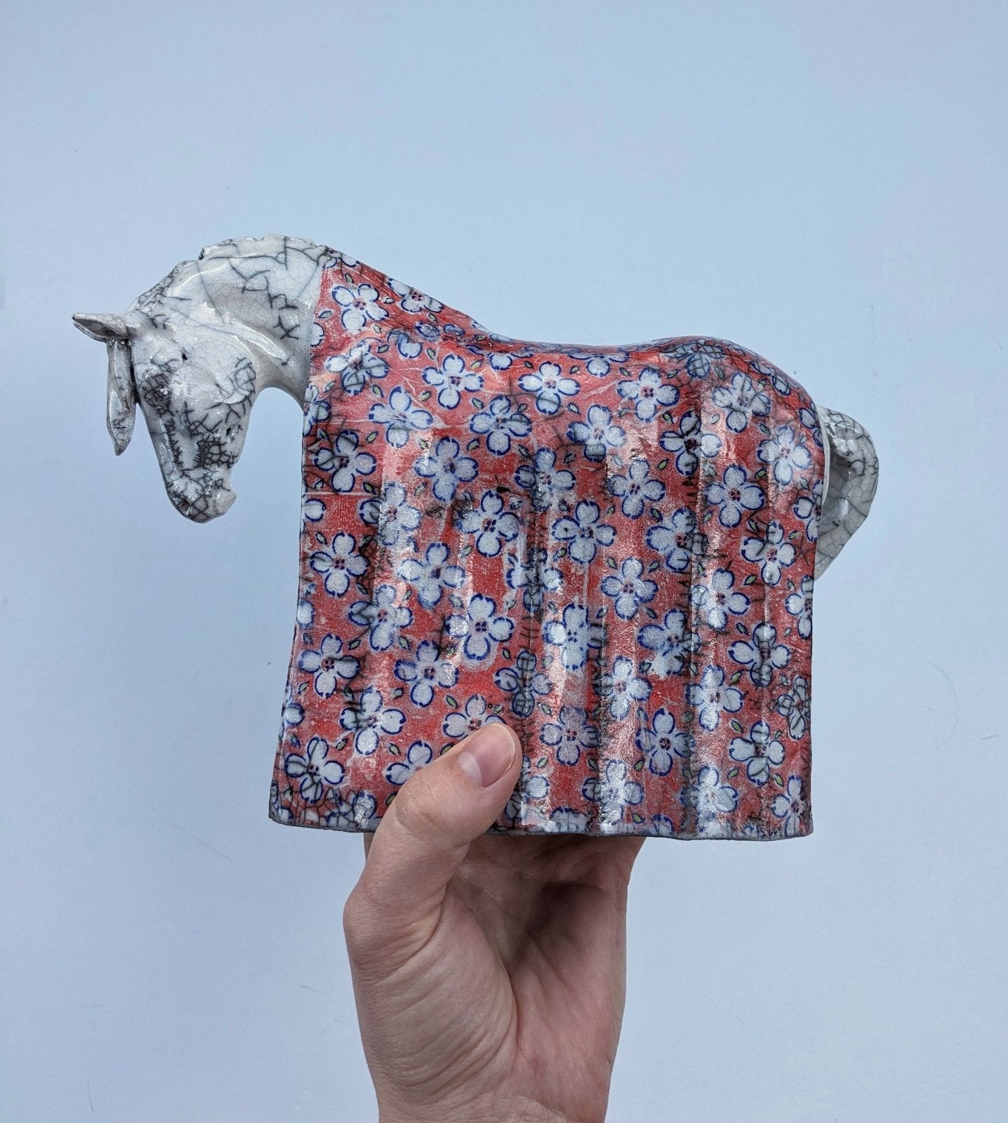 Ceramic raku horse sculpture with Japanese decals by Susie Benes