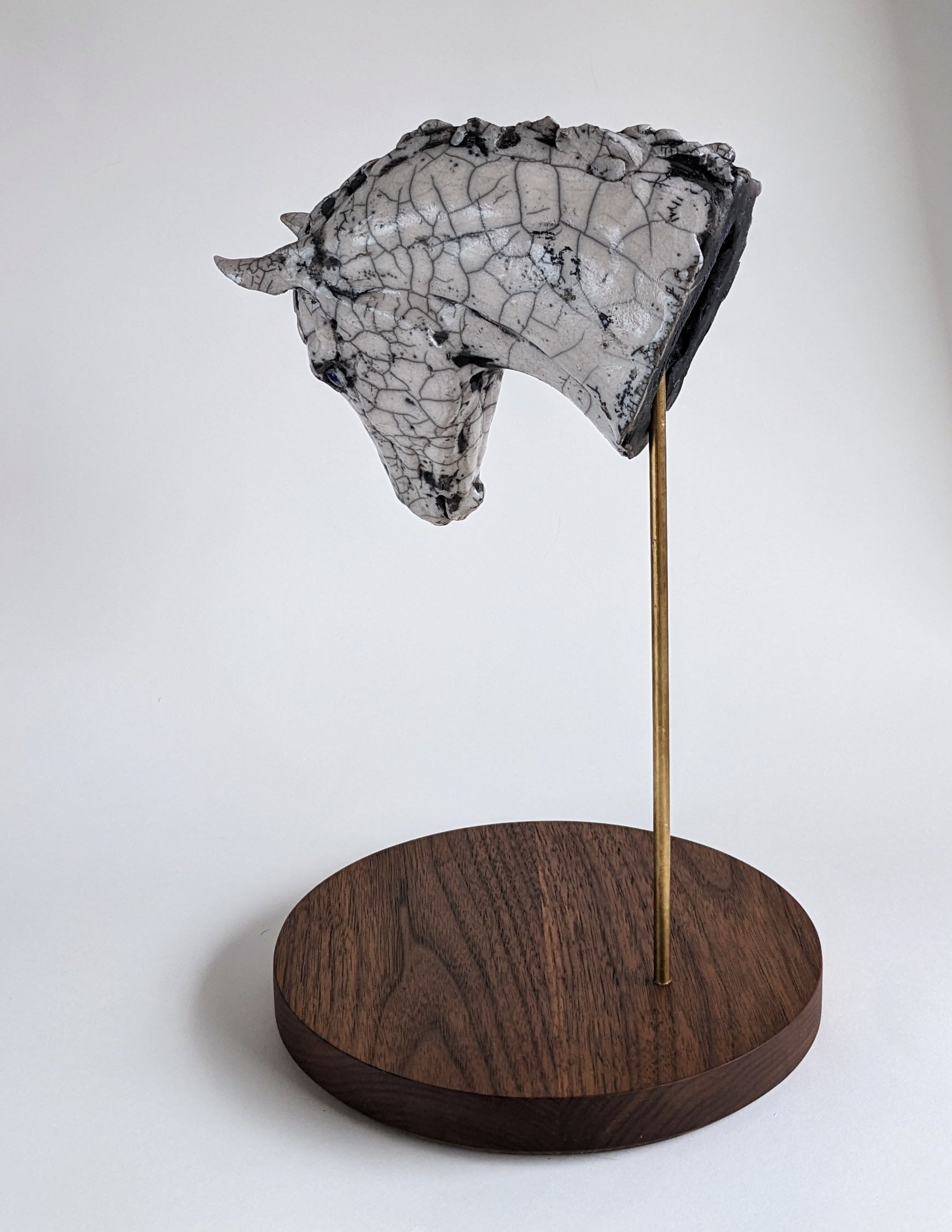 White crackle ceramic horse head sculpture by Susie Benes