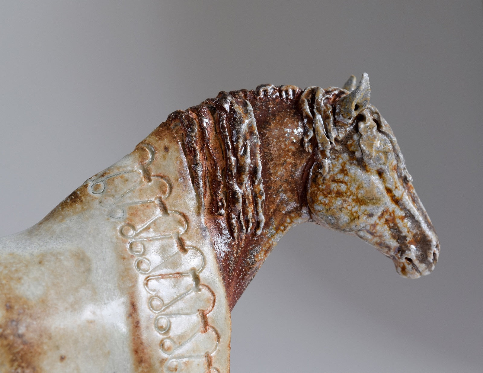 Wood fired ceramic horse sculpture close up by Susie Benes