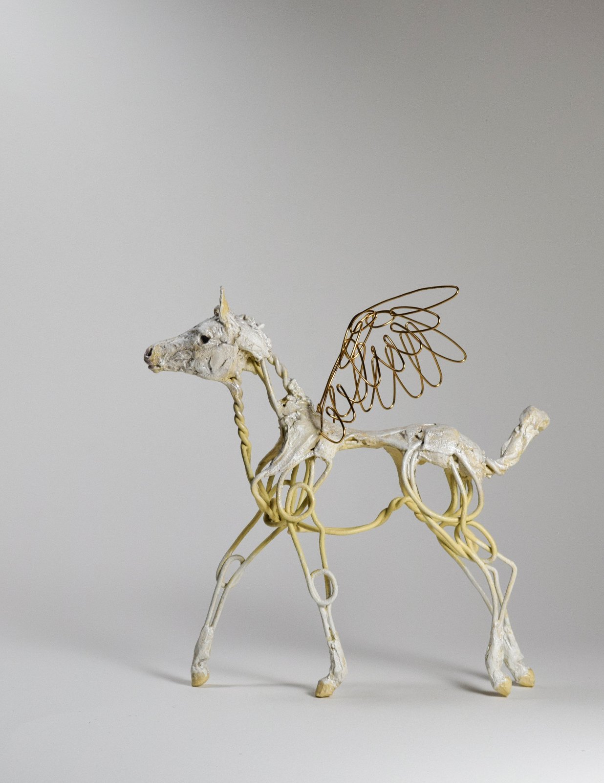 Wire and clay pegasus horse sculpture by Susie Benes
