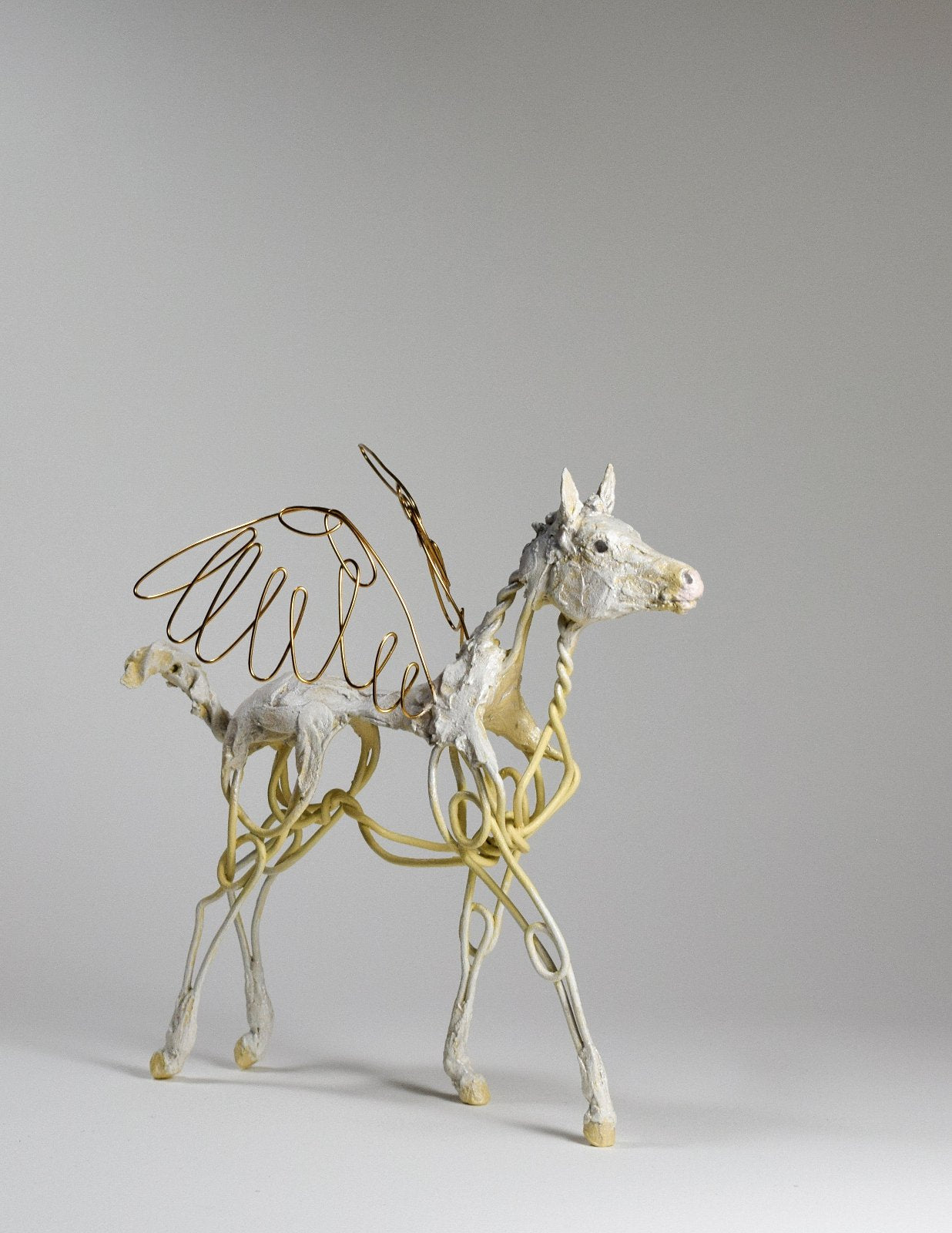 Wire and clay pegasus horse sculpture by Susie Benes