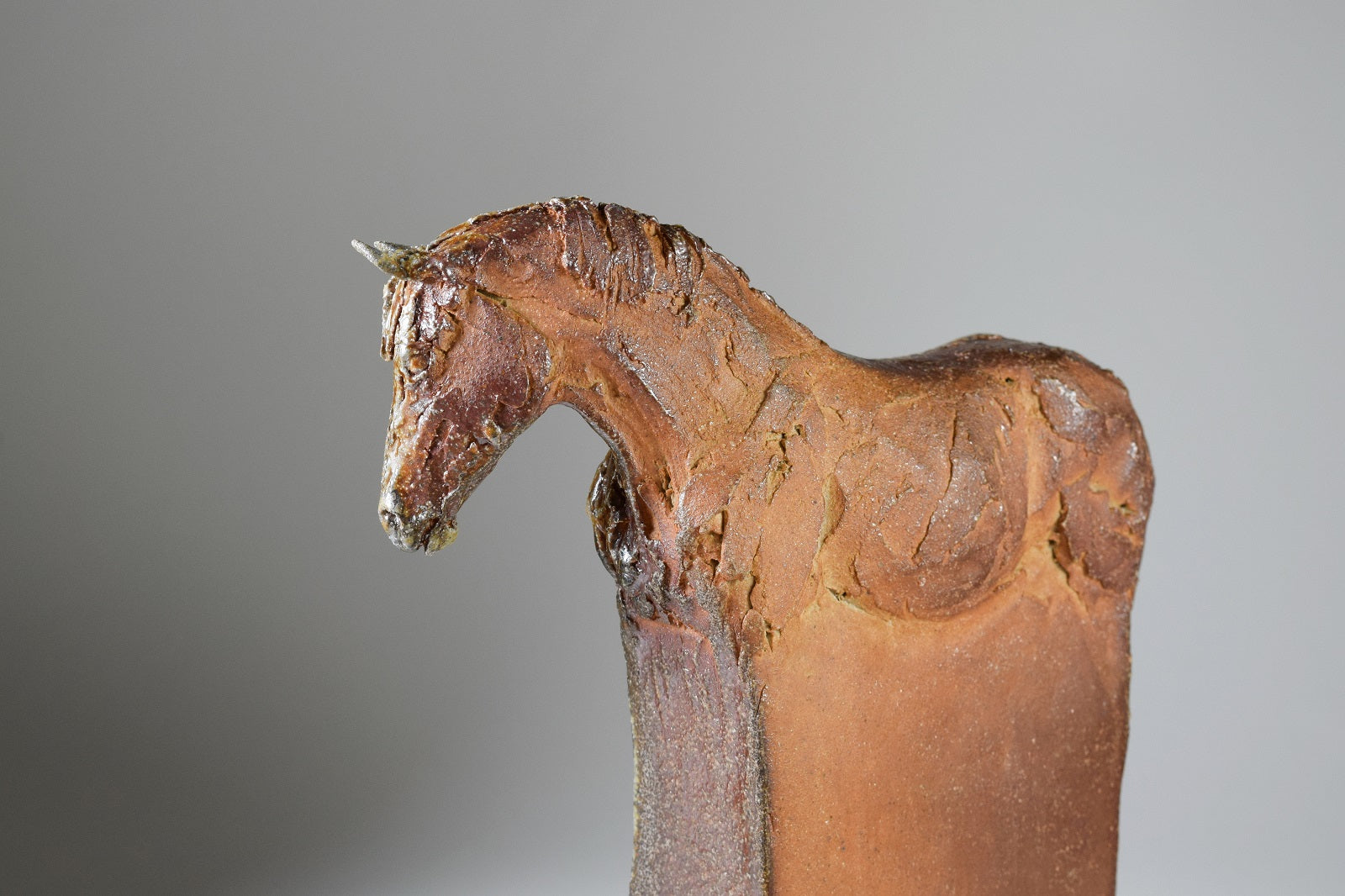 Wood fired pony sculpture on plinth by Susie Benes