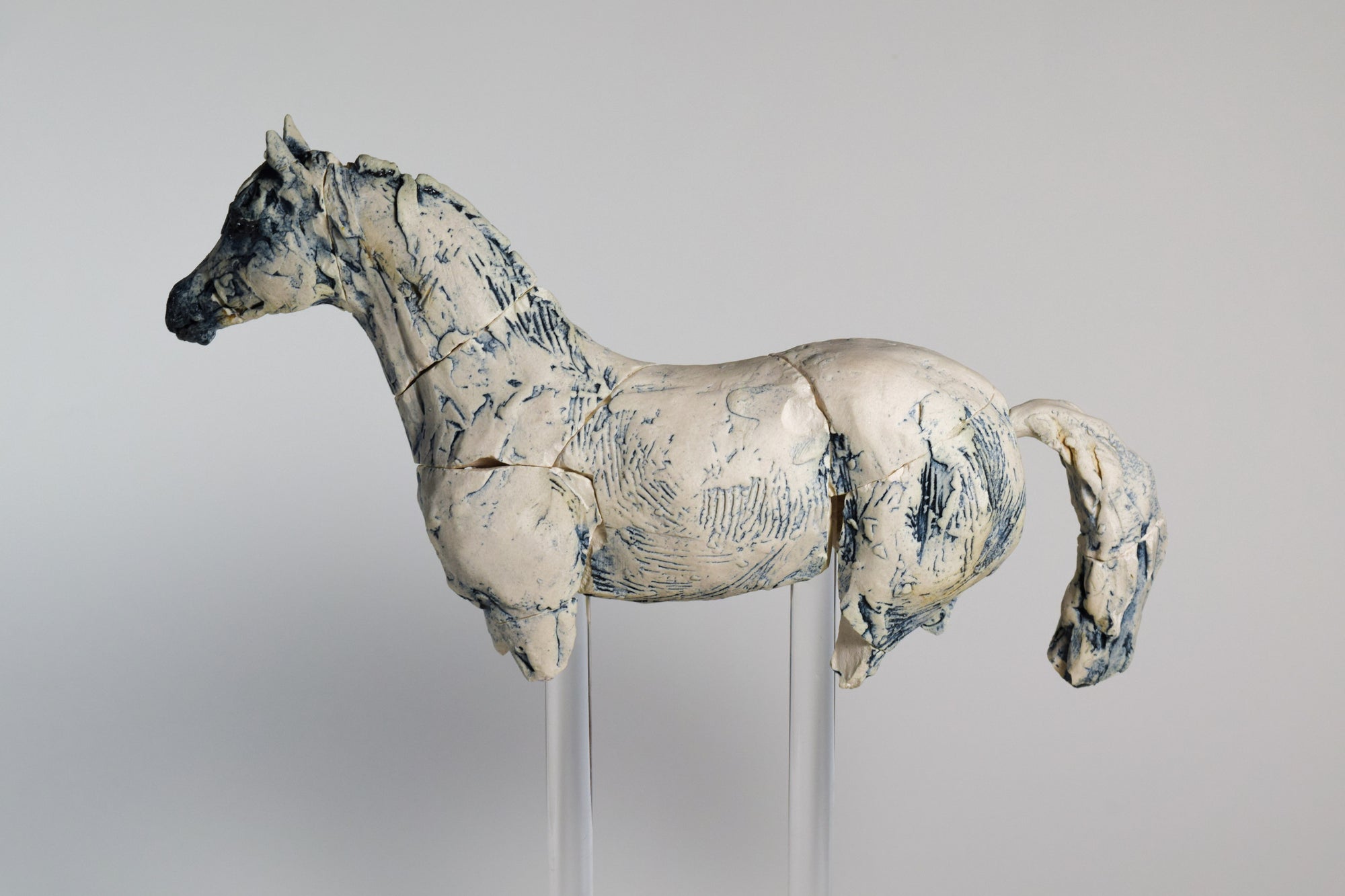 Porcelain Arabian horse sculpture by Susie Benes