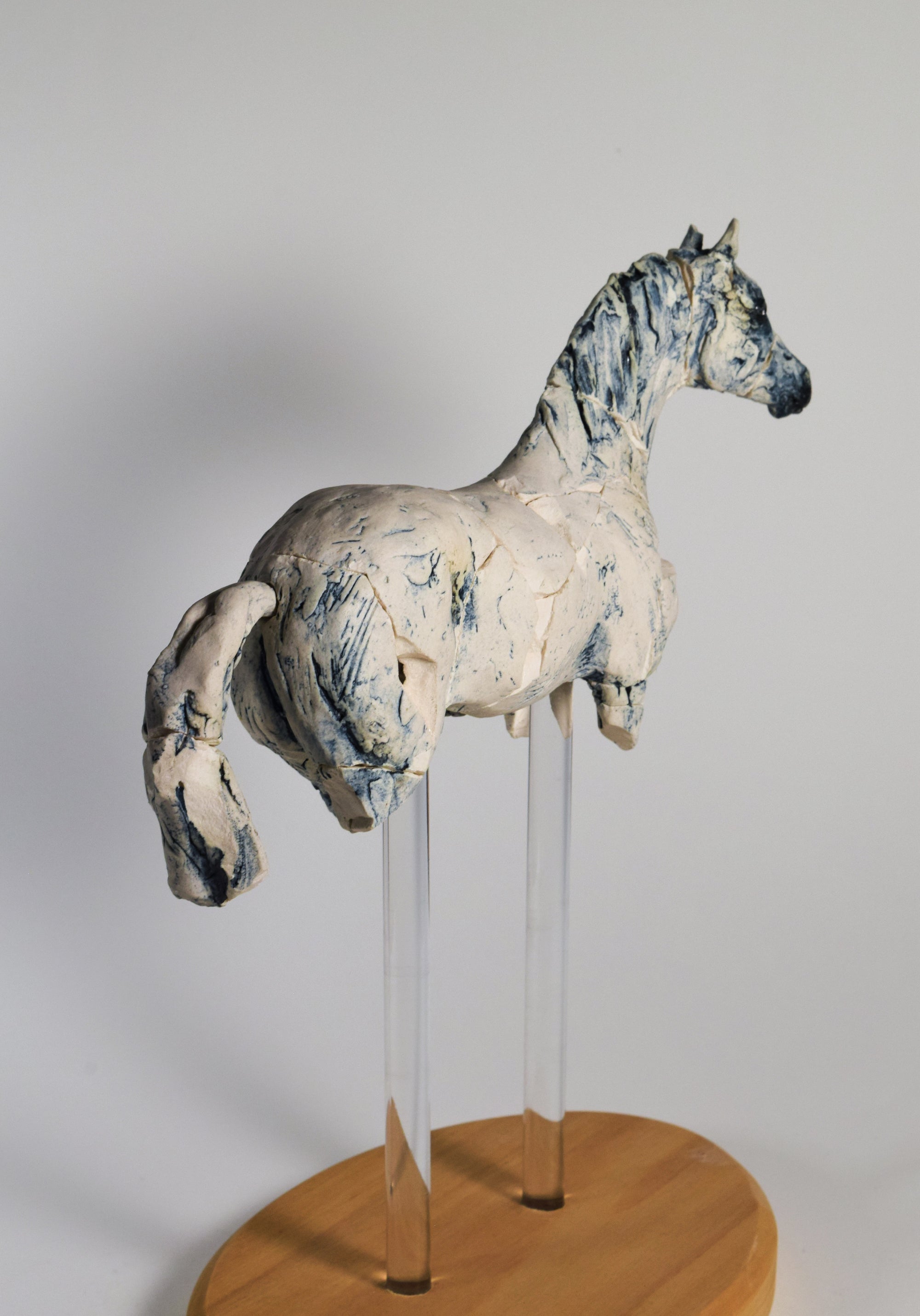 Porcelain Arabian horse sculpture by Susie Benes
