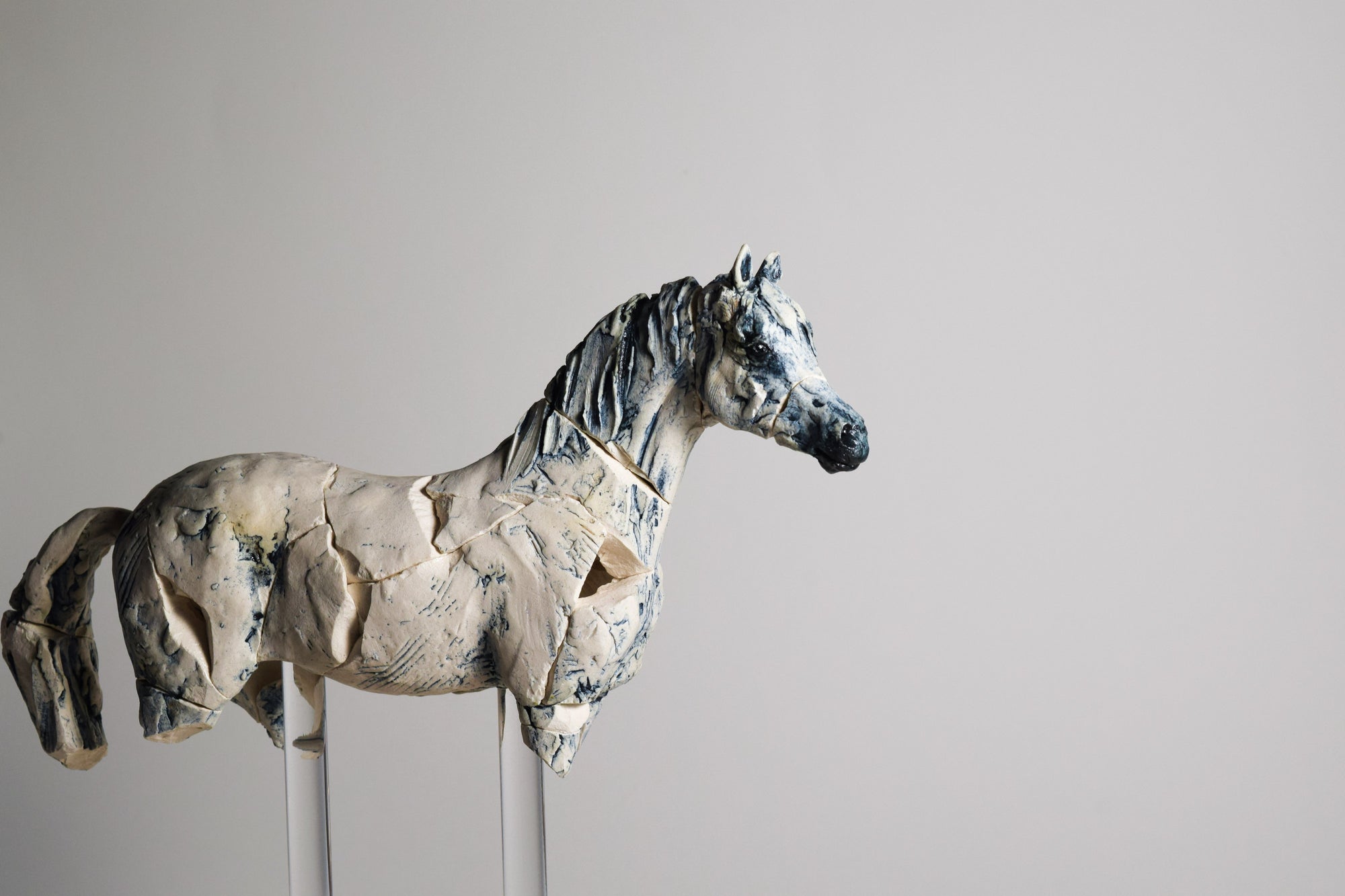 Porcelain horse sculpture by Susie Benes